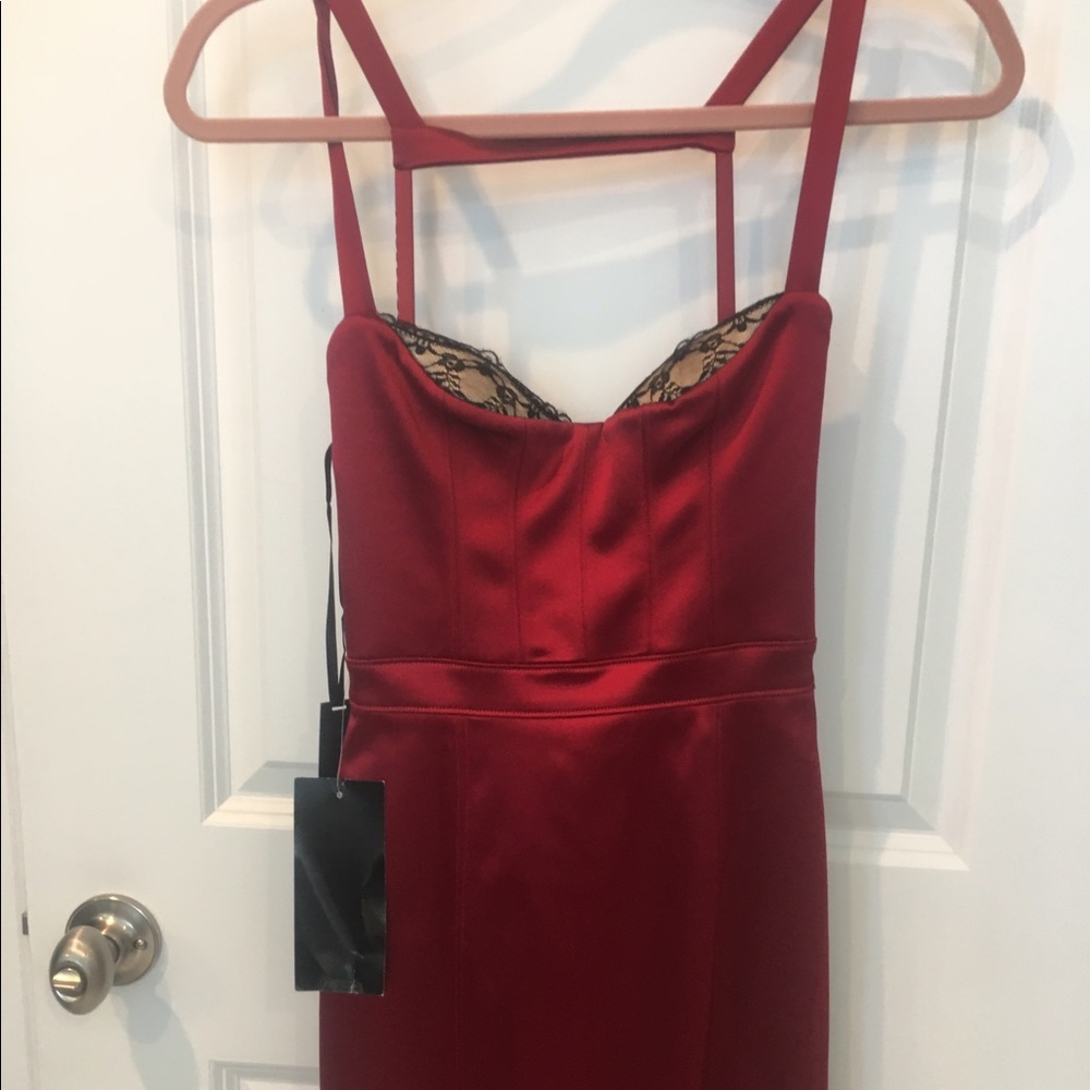 Brand new Bebe red fitted dress