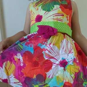 Flowered dress with polka dot belt