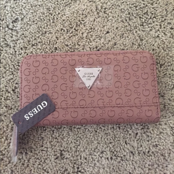 Guess Handbags - 💕BrandNew Guess Logo zip-around wallet💕