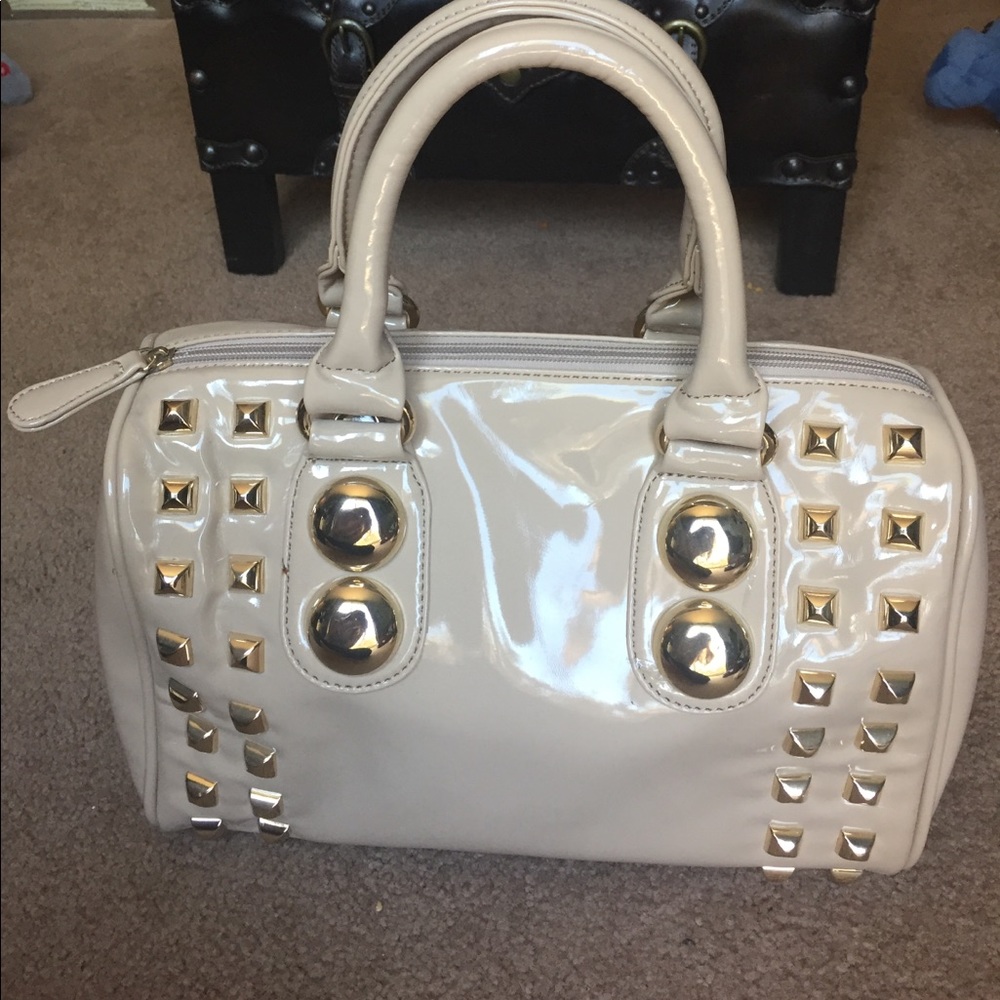 Aldo studded patent leather handbag