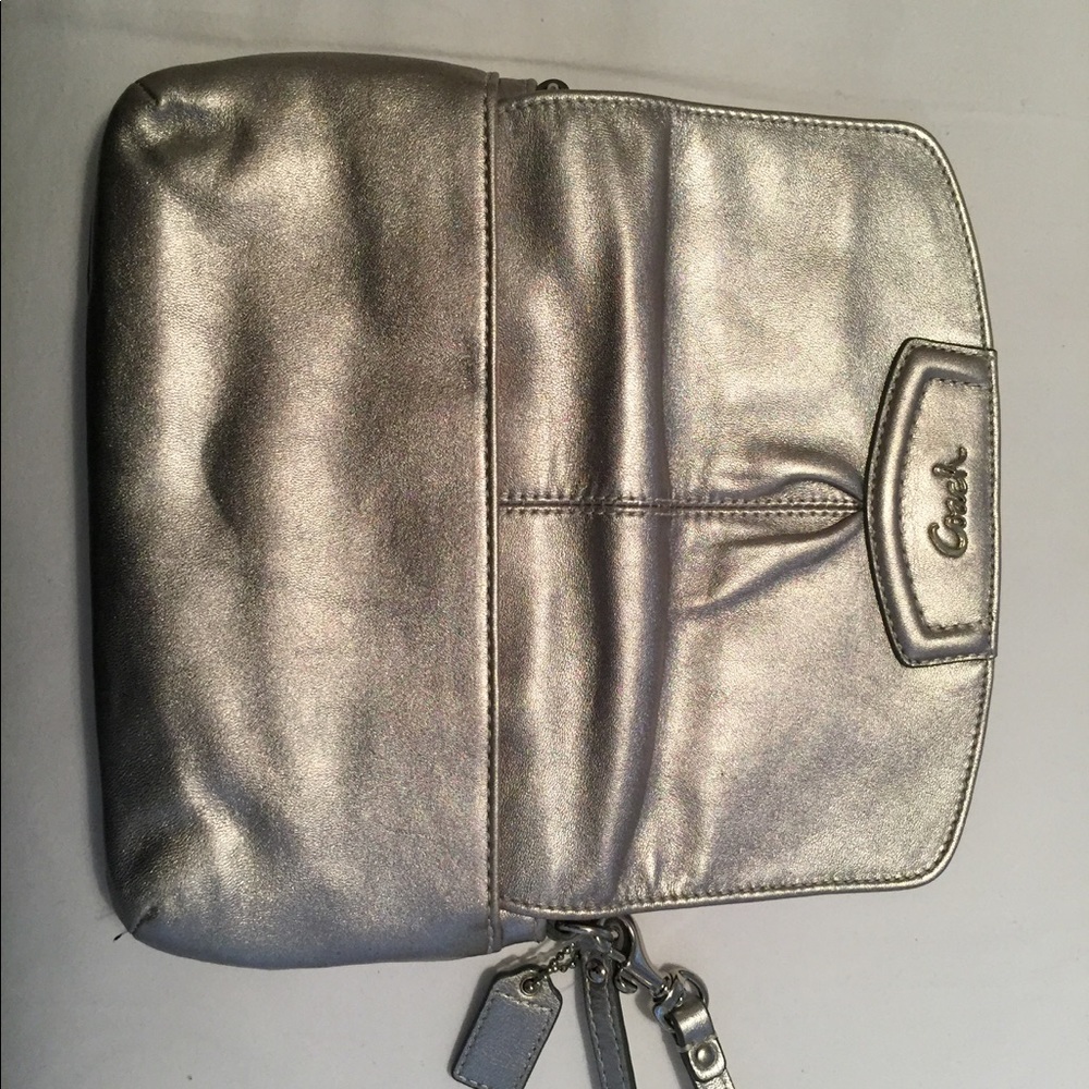 Never used Coach large flap wristlet. - Picture 5 of 7