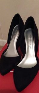 Brand new pair of black suede pumps