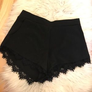 Black shorts with lace fringe