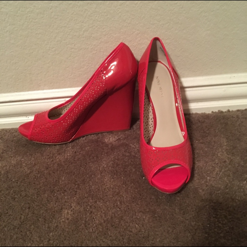 Brand new Nine West perforated peep toe wedges!
