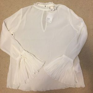 Pleated white blouse