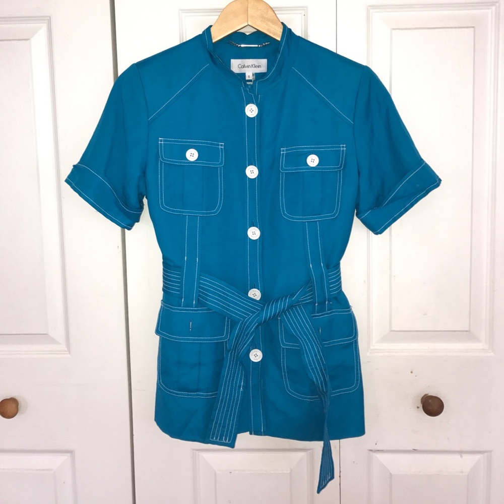 Vintage Calvin Klein blue top with white buttons.