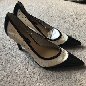 Black and off white perforated heels