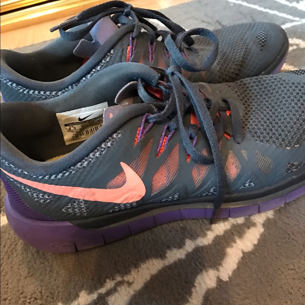 Nike gray and purple free runs