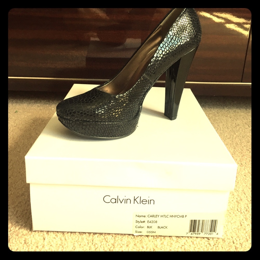 Snake skin heels. Worn once!! In original box.