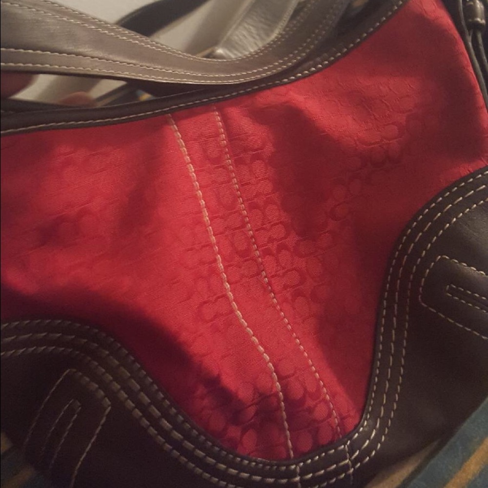 Brown and red coach purse