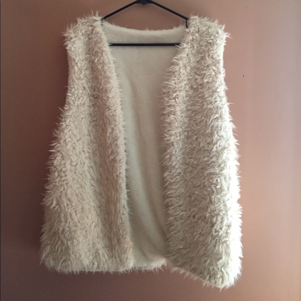 White furry vest/sweater