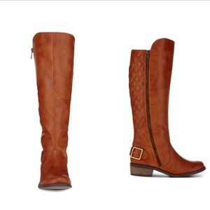 Brown knee height boots