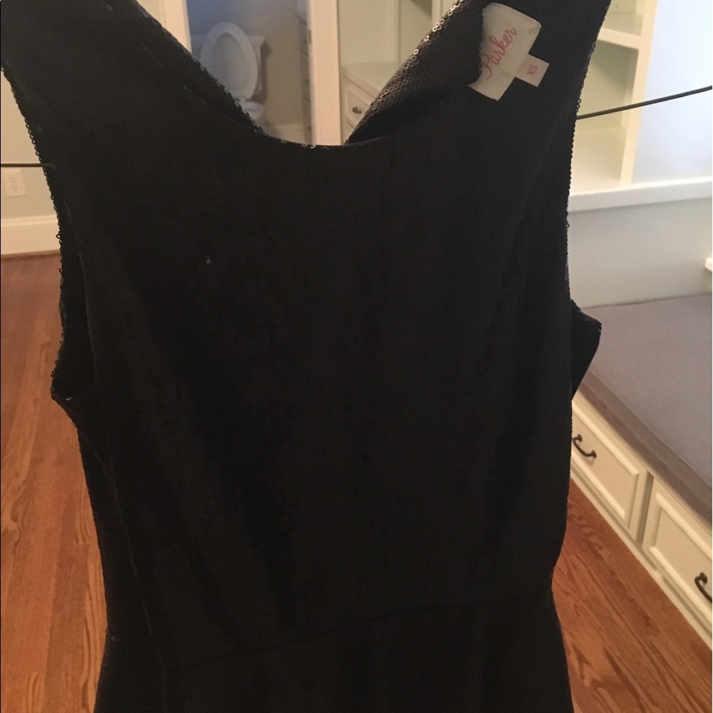 Peplum sequin black sequin top