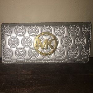 AUTHENTIC used Michael Kors wallet.