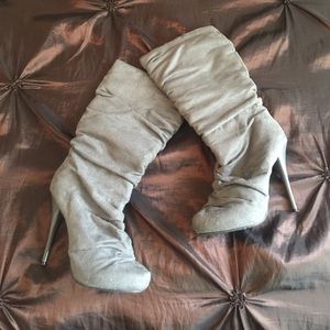 Grey knee high boots with stiletto heels
