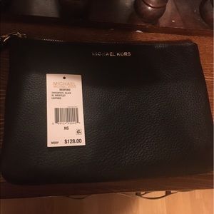 Authentic MK XL size wristlet
