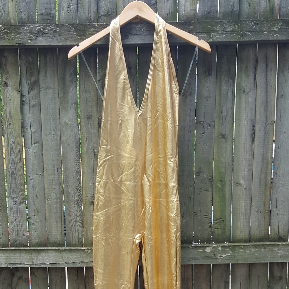 Metallic gold halter catsuit