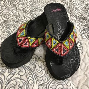 Aztec beaded flip flops