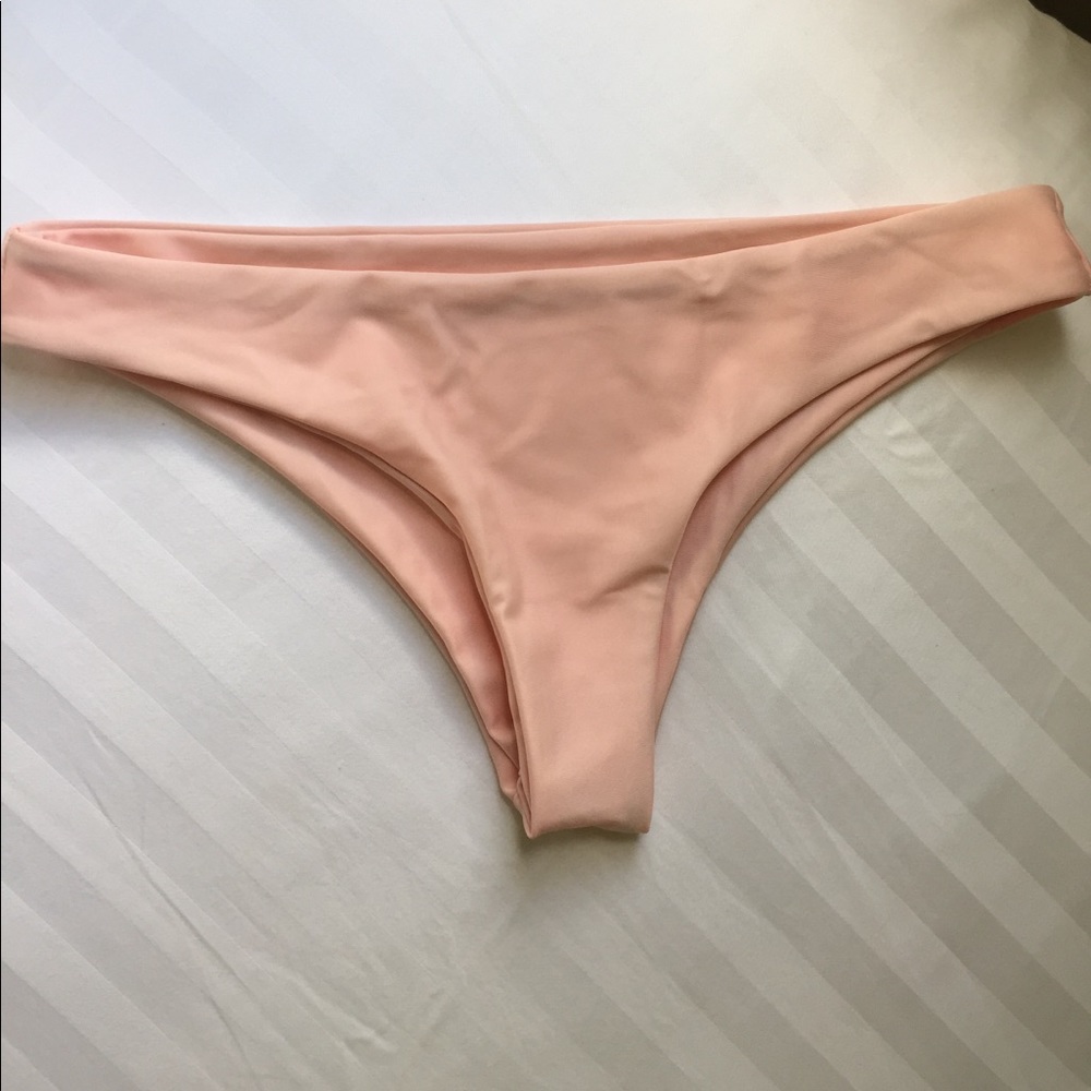 Light pink cheeky bathing suit bottoms