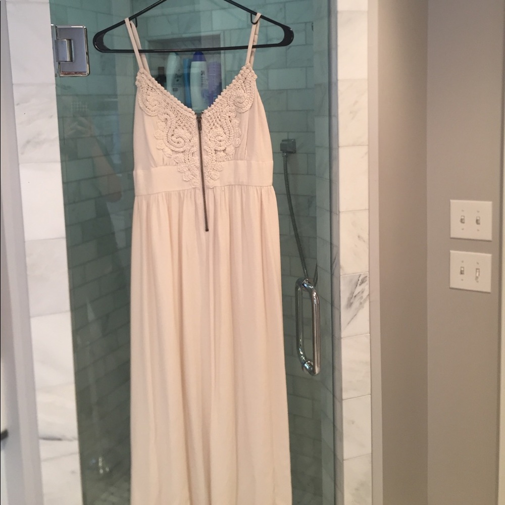 Bohemian beige maxi dress with neckline detail