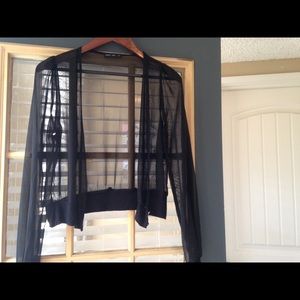 Sheer black jacket. Really cute!