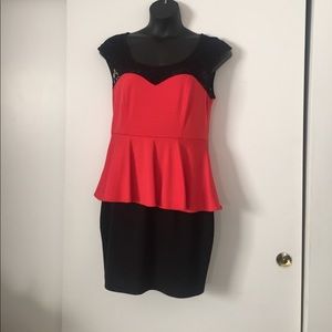 Beautiful orange and black peplum dress