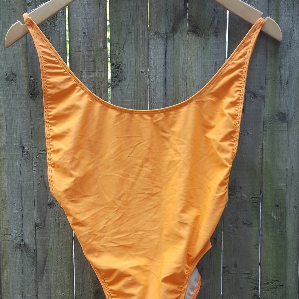 The nylon tricot high-cut one-piece
