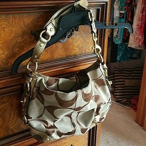 Gold and tan coach purse