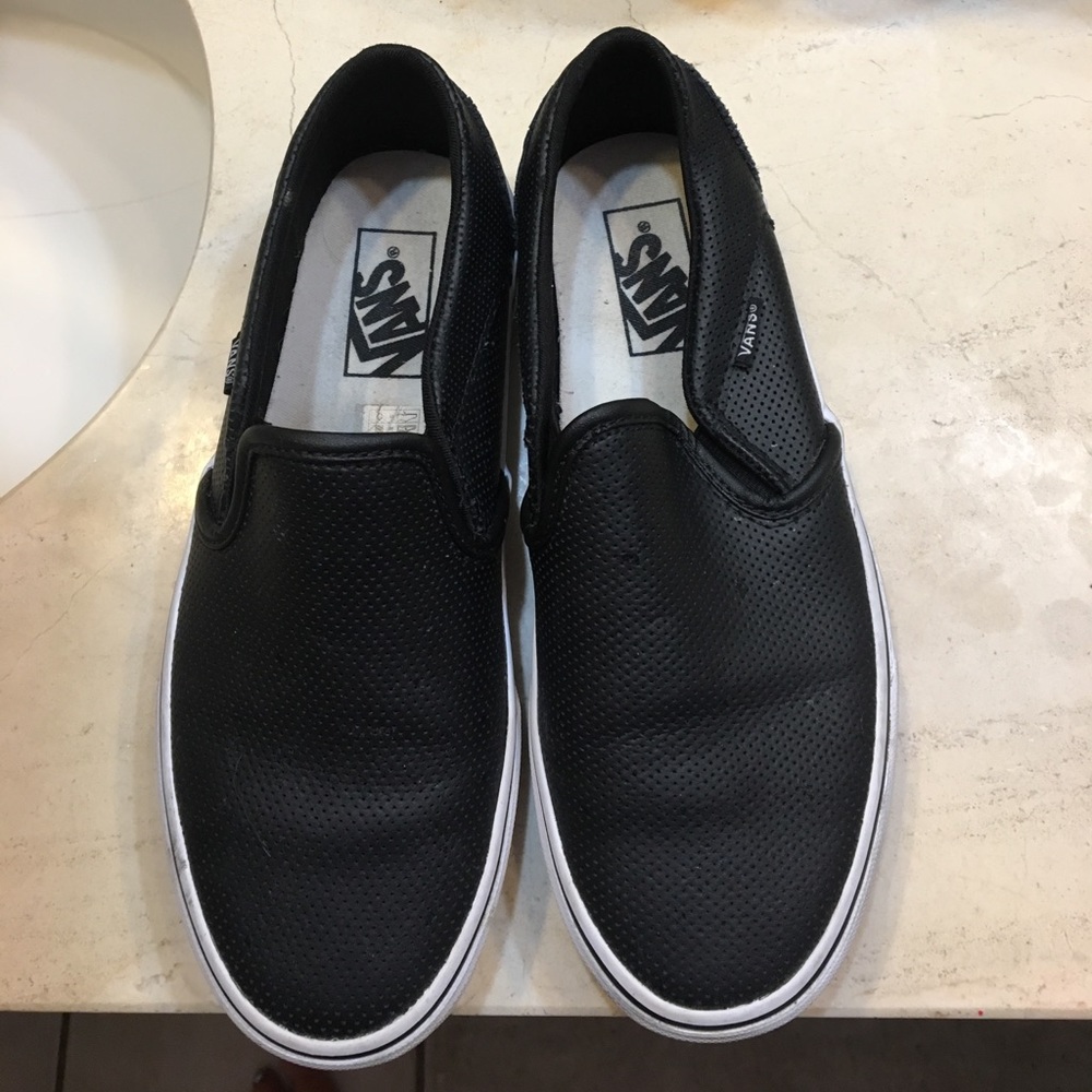 Perforated black vans