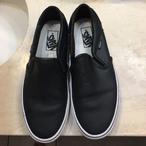 Perforated black vans