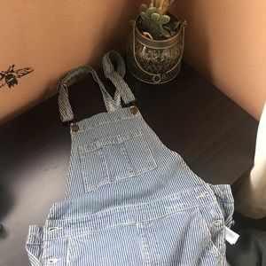 Distressed stripe overalls.
