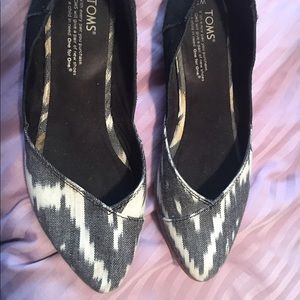 Black and white pointed toe TOMS