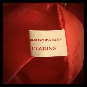 Clarins Bags - Clarins white purse Clarins Bags - Clarins white purse