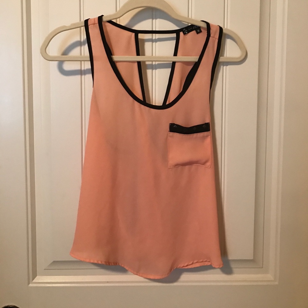 Peach and black dressy tank top.