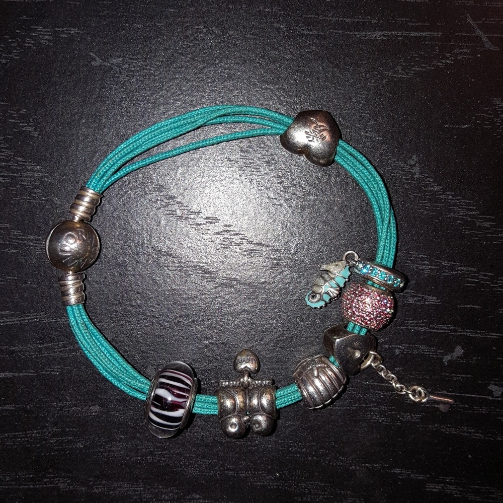Pandora teal multi strand bracelet with 7 charms
