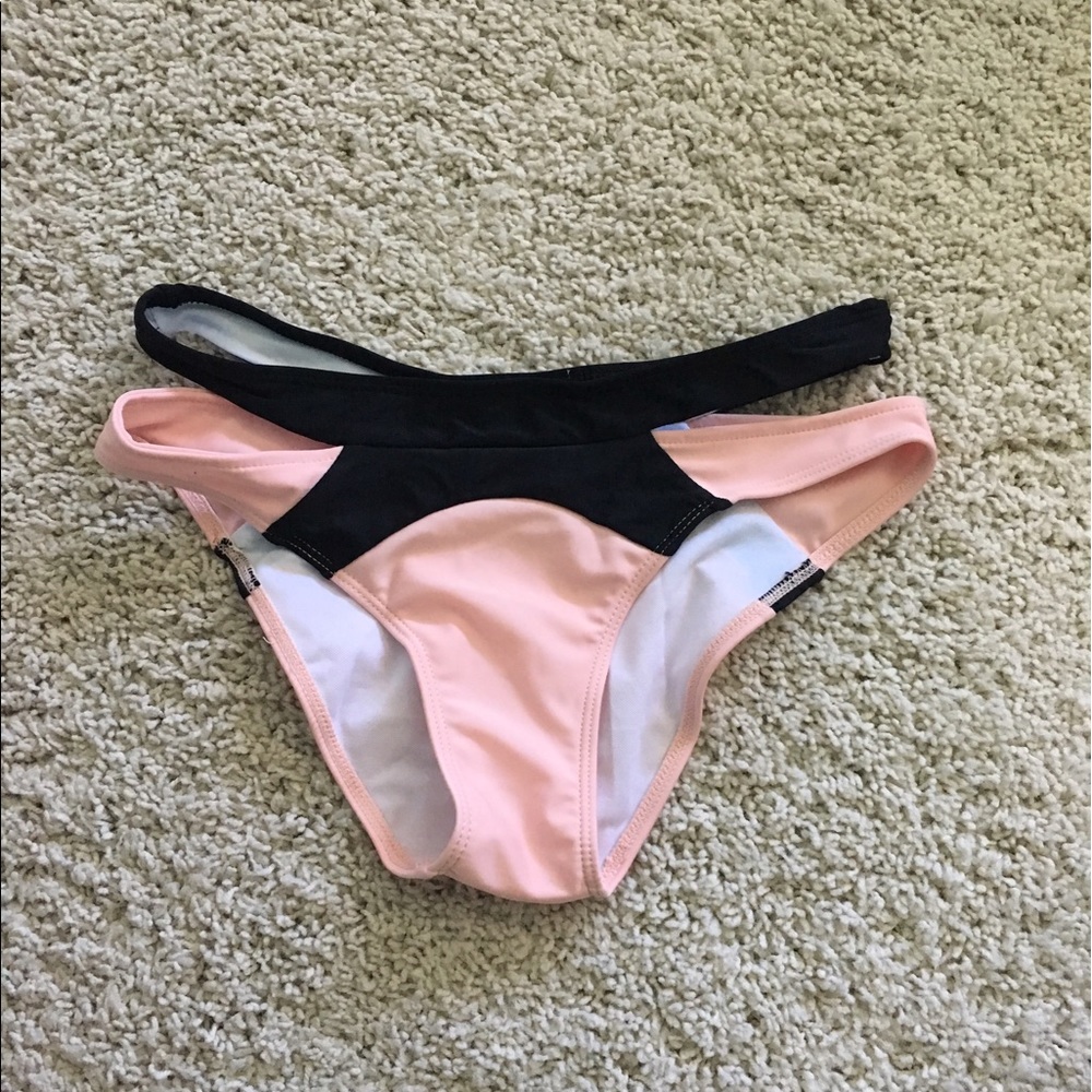 Pink and black bikini bottoms