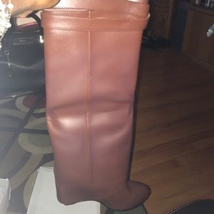 Never worn. Has scratches. Too small