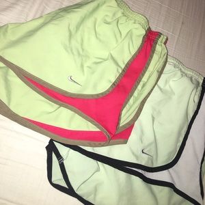 two pairs of nike shorts