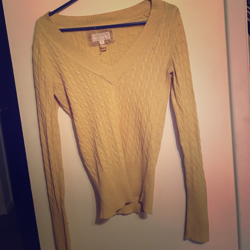 Yellow cable knit sweater