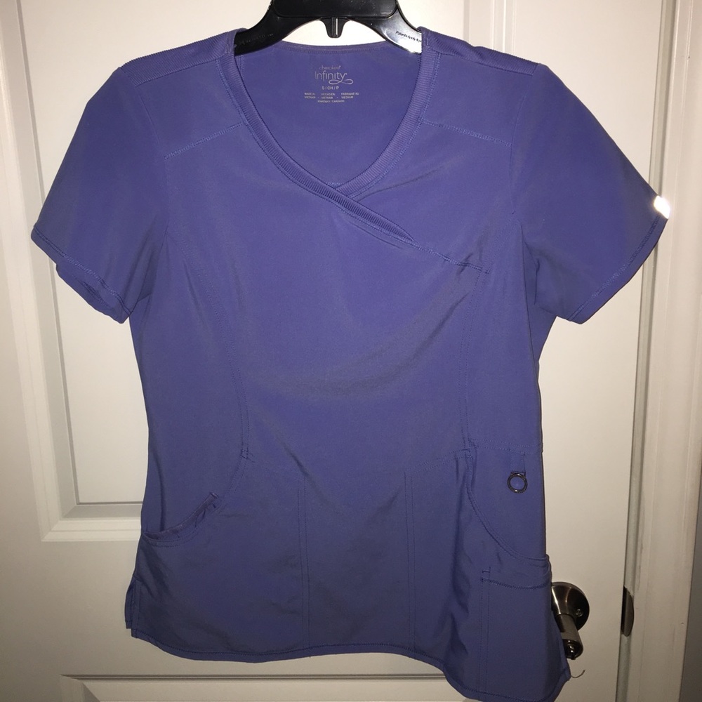 Cherokee Infinity Seal Blue Women's Scrub Top.