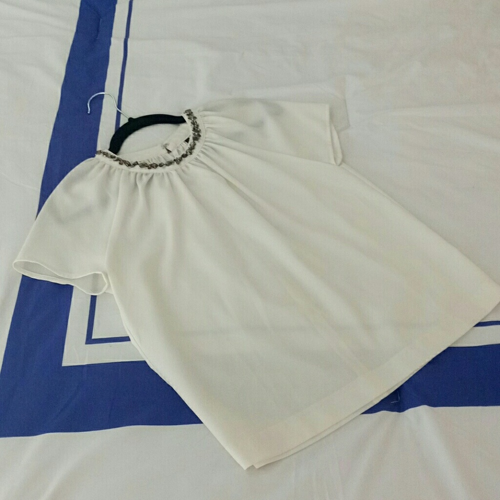 Blouse with embellishment