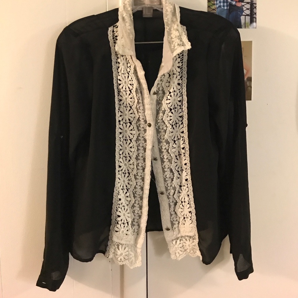 Sheer black button down with white floral trimming