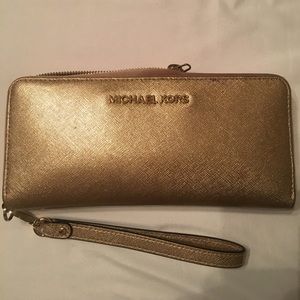 Gold Michael Kors Wallet with wristlet option