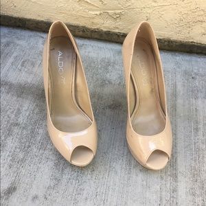 Nude open toe pumps