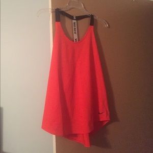 Orange racerback Nike tank