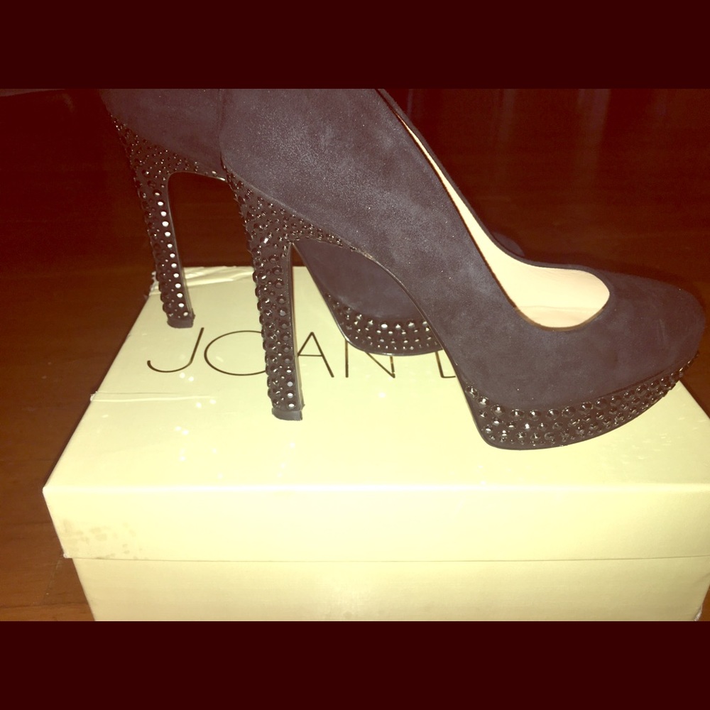 Joan and David Suede Daqasina platform heel.