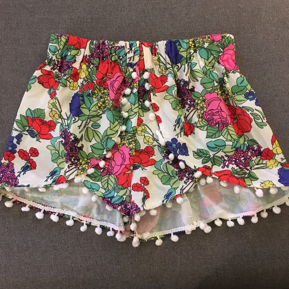 TOBI Pom Ball Fringe Shorts with Floral Pattern