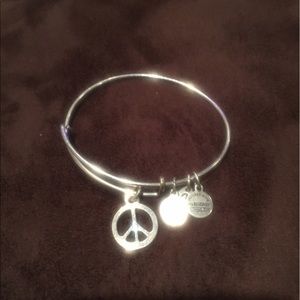 Silver Alex & Ani bracelet peace sign
