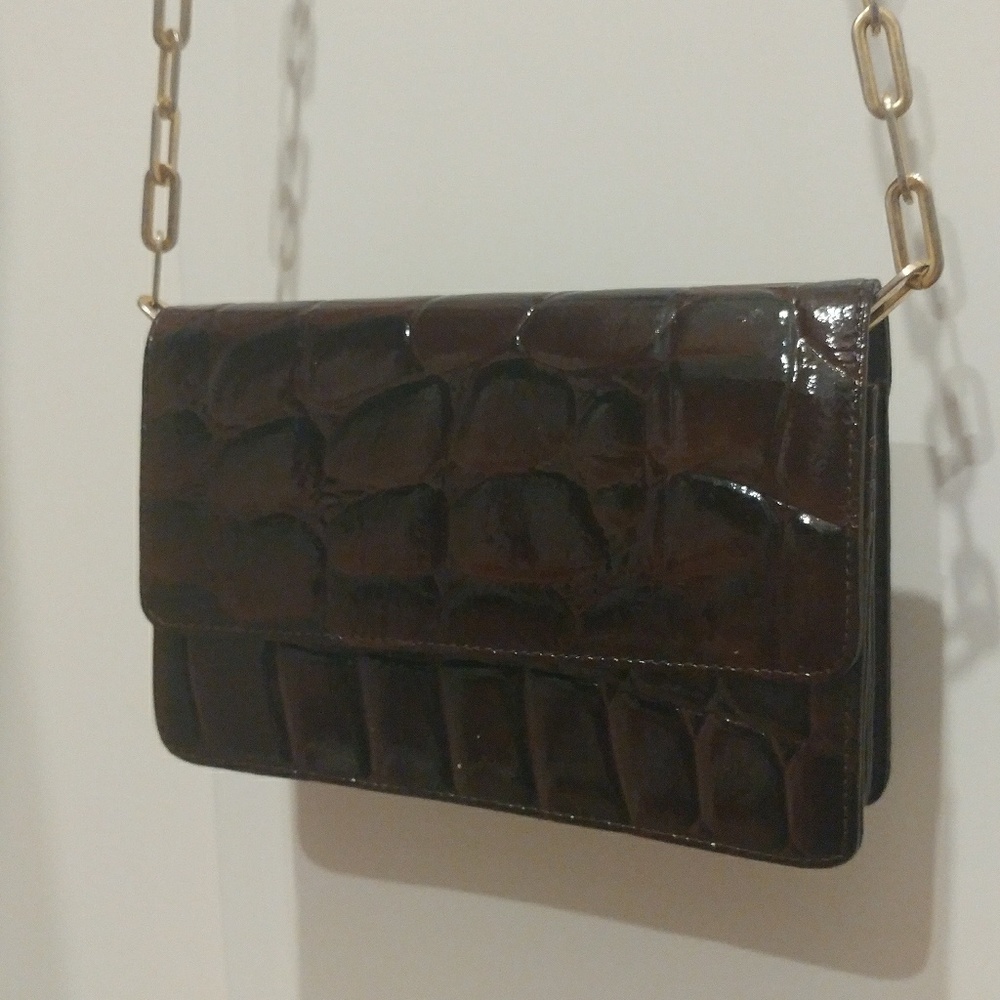 Burgundy leather clutch handbag