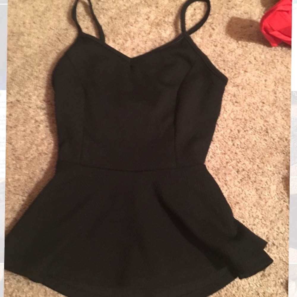 Black peplum tank open back